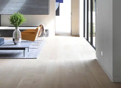 living room with eco friendly wide plank floors